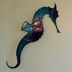 4-Piece Metal Wall Art by Acclaimed Artist